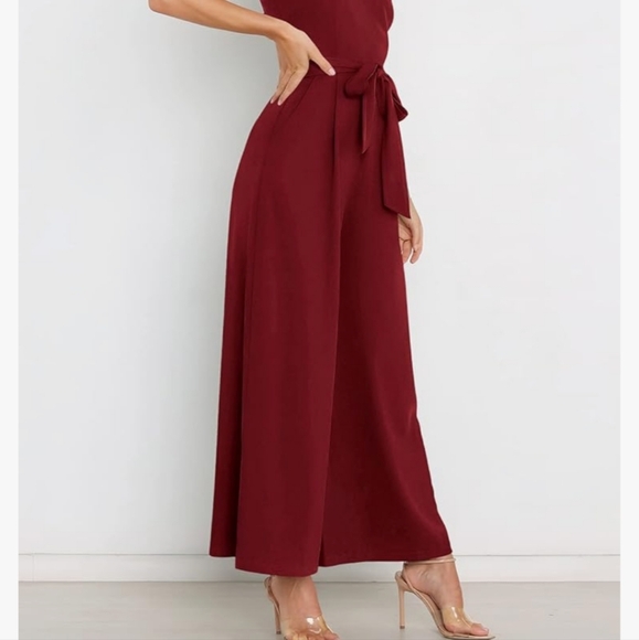 NWOT. Chic one-shoulder jumpsuit w/pockets and tie at the waist. Size Medium - Picture 5 of 5